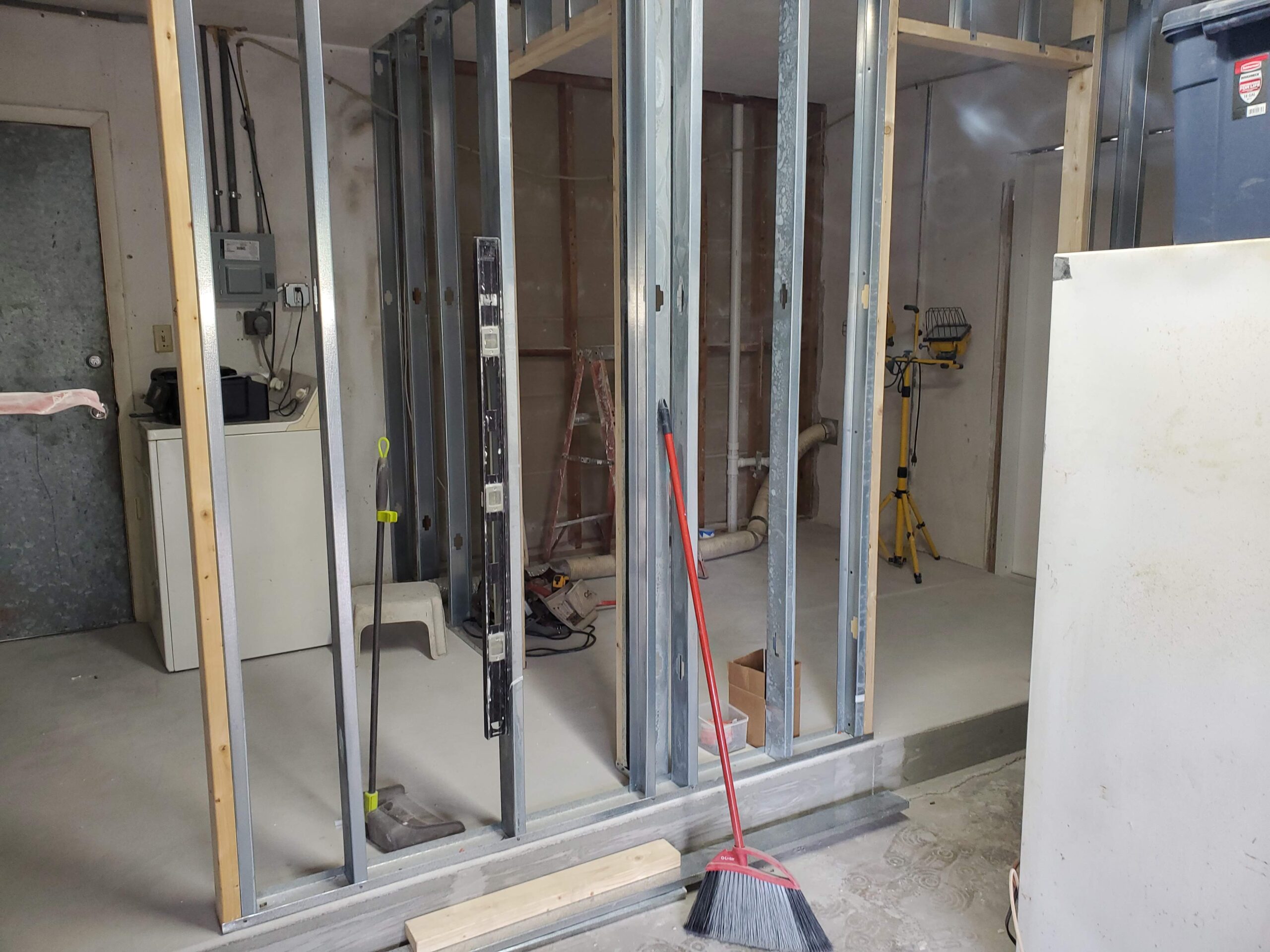 Jobsite photo: utility room partition wall during rough framing stage