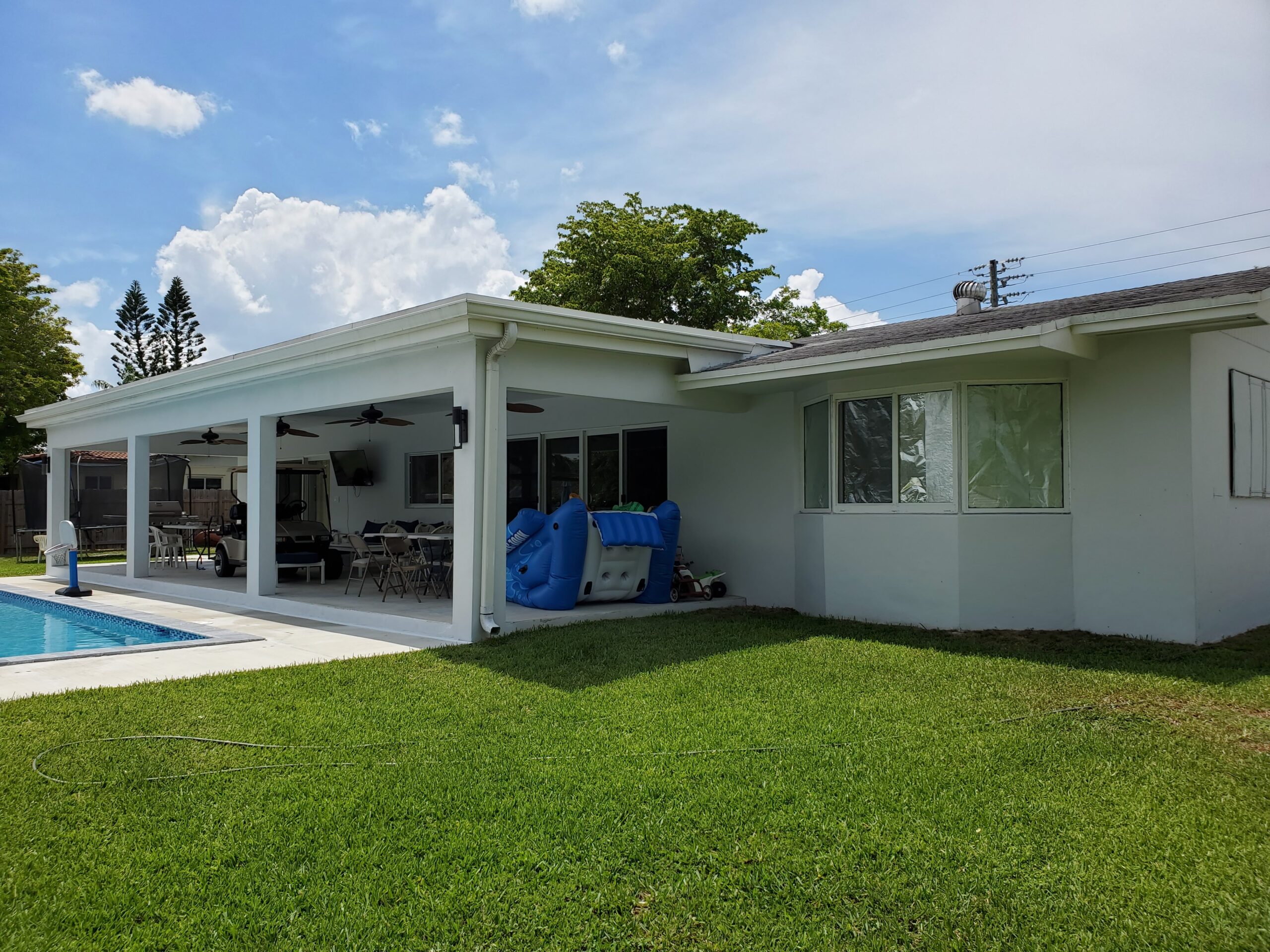 Jobsite photo: covered patio and pool renovation nearing completion