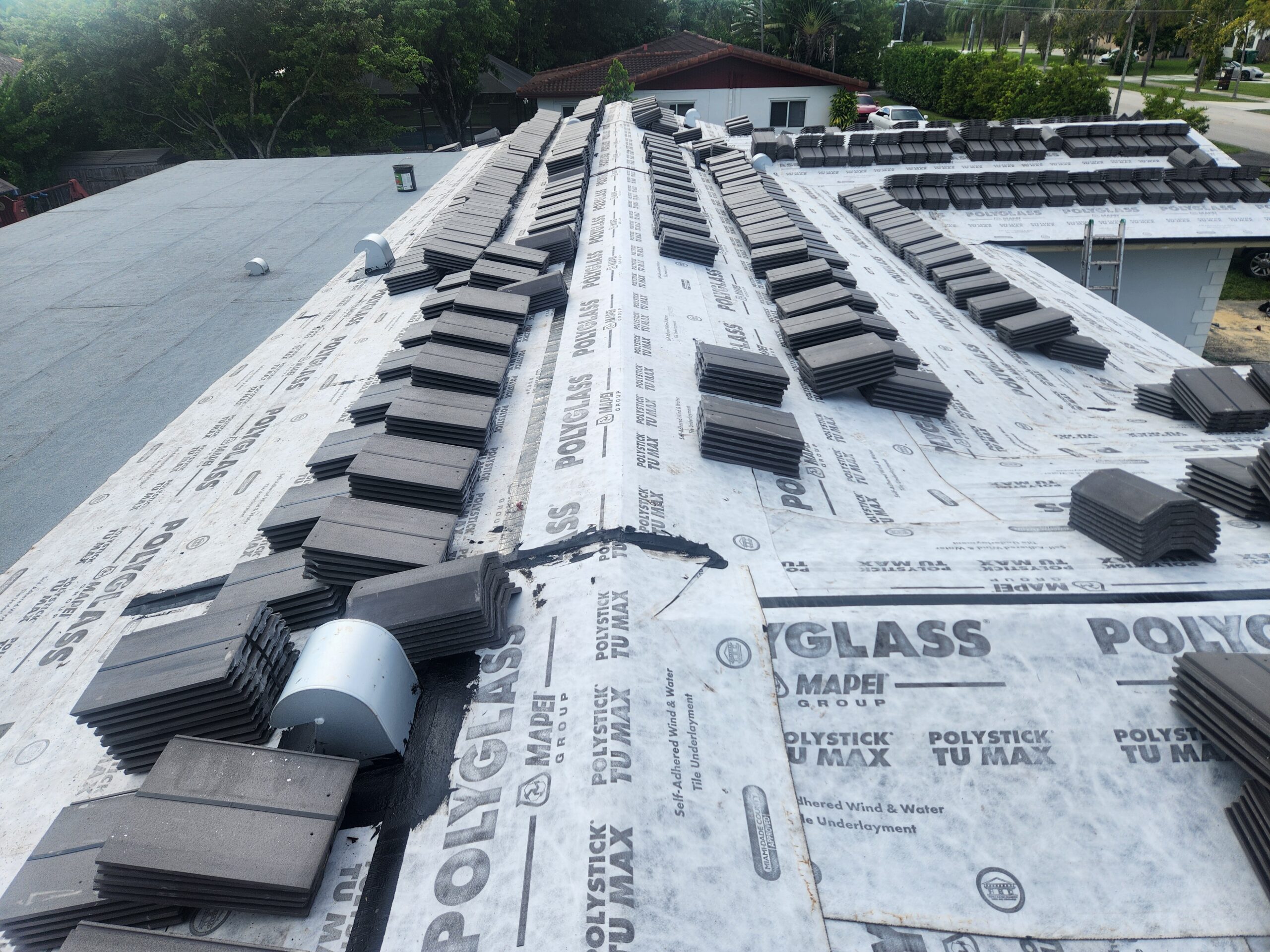 Jobsite photo: Roof replacement during tile installation